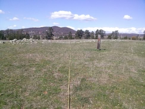Plotting out the Eastern corner of a survey site at Jerrabomberra East.